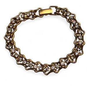 Gold bracelet with rhinestones